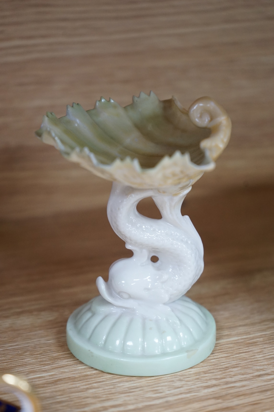 A Worcester butterfly handled cup and saucer and four other items, together with Royal Crown Derby, Dresden and Coalport items. (9). Tallest 13 cm